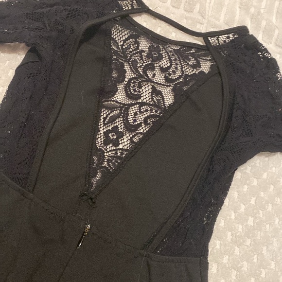 Black dress with lace cutouts - Picture 3 of 3